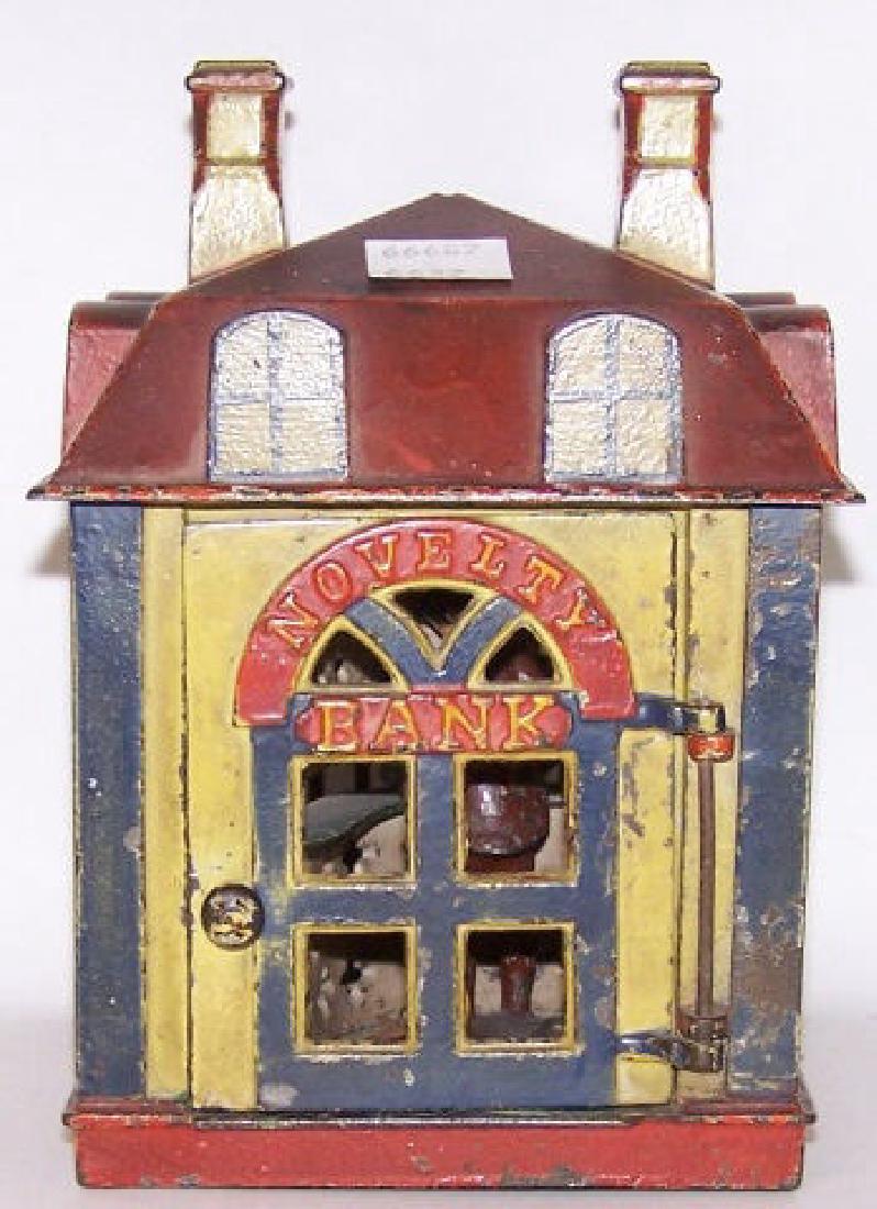 *CAST IRON MECHANICAL BANK (1 of 5)