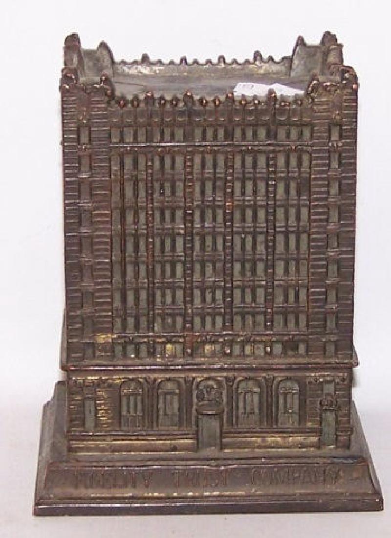 *CAST IRON FIGURAL STILL BANK (1 of 4)