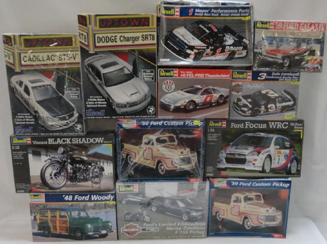 *12 REVELL PLASTIC MODEL CAR KITS: 2 '50 Ford custom pick ups, Ford Focus WRC, '48 Ford Woody, Vincent Black Shadow, etc., in original boxes.