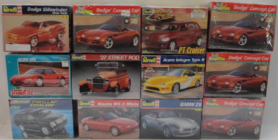 *12 REVELL PLASTIC MODEL CAR KITS: Cadillac Escalade, Acura NSX, PT Cruiser, BMW Z8, Acura Integra Type R, etc., in original boxes.