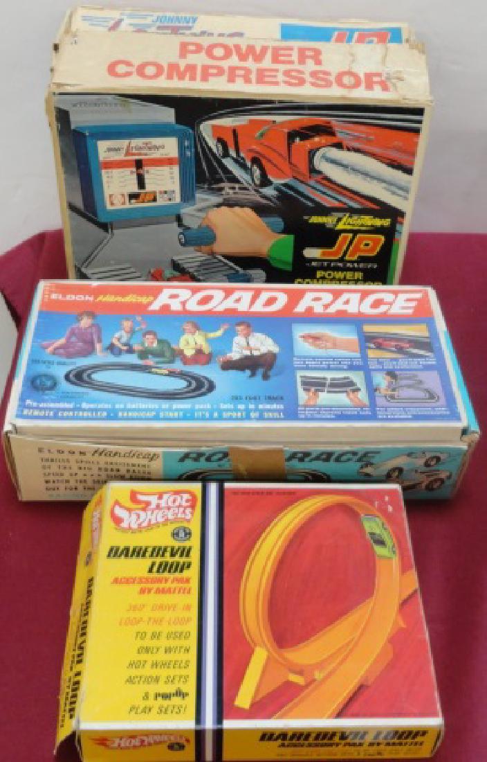 *3 RACING ITEMS: Johnny Lightning power compressor, Road Race, and Hot Wheels Daredevil Loop, all with original boxes.
