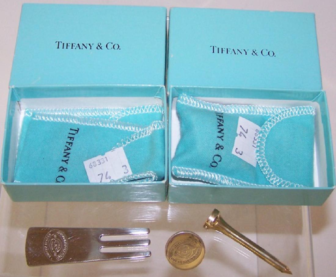 3 PIECES OF TIFFANY STERLING SILVER: Ball marker, tee and divot tool enclosed in tiffany boxes, all pieces marked Tiffany Studios 925, ball marker and divot tool marked United States 90th Open Championship.