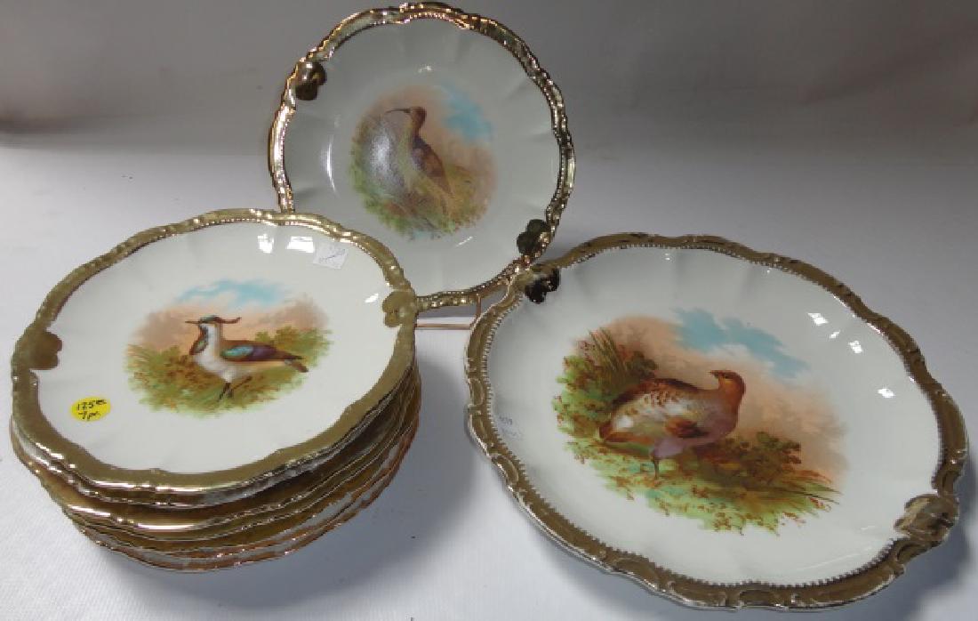 *9-PIECE BAVARIAN PORCELAIN GAME BIRD SET: Having 8 individual plates with gilt border, approximate diameter 9", and matching serving platter, diameter 13".