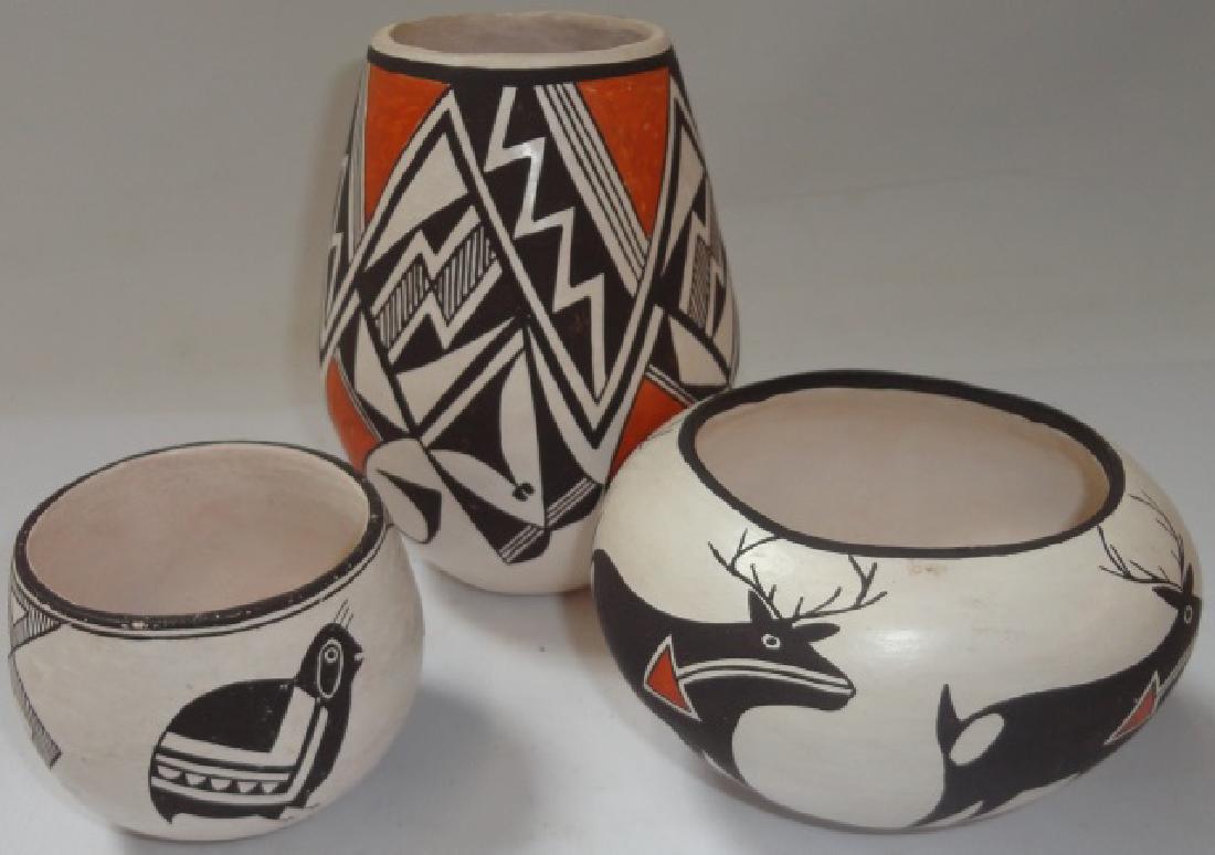 *3 ACOMA POTS: 1 signed illegibly on underside, approximate height 3", 1 signed "Lucy M. Lewis", height 3 1/2", and 1 signed "Lucy M. Lewis", height 6".