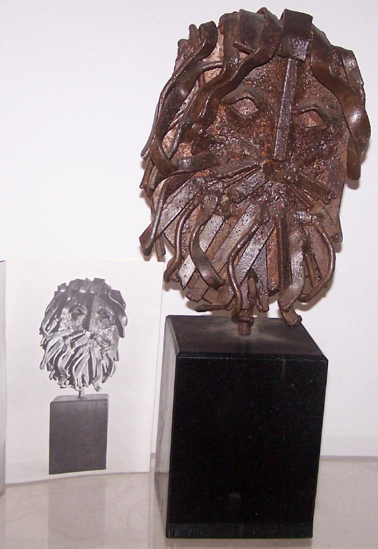 *PEARSON, JAMES EUGENE: (1939-2017 American) Abstract face, metal sculpture, unsigned, approximate height 11 1/2", with base 18 1/2".