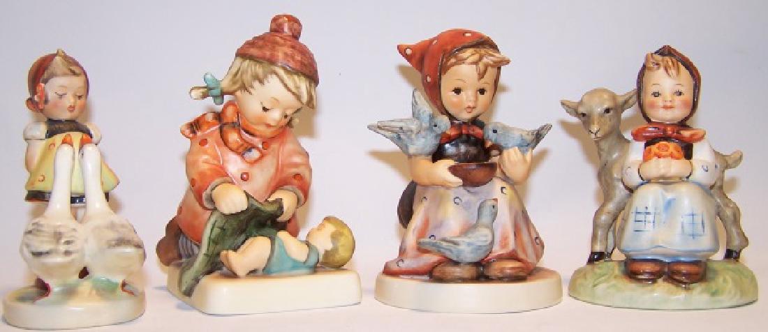 *4 HUMMEL FIGURINES (1 of 3)