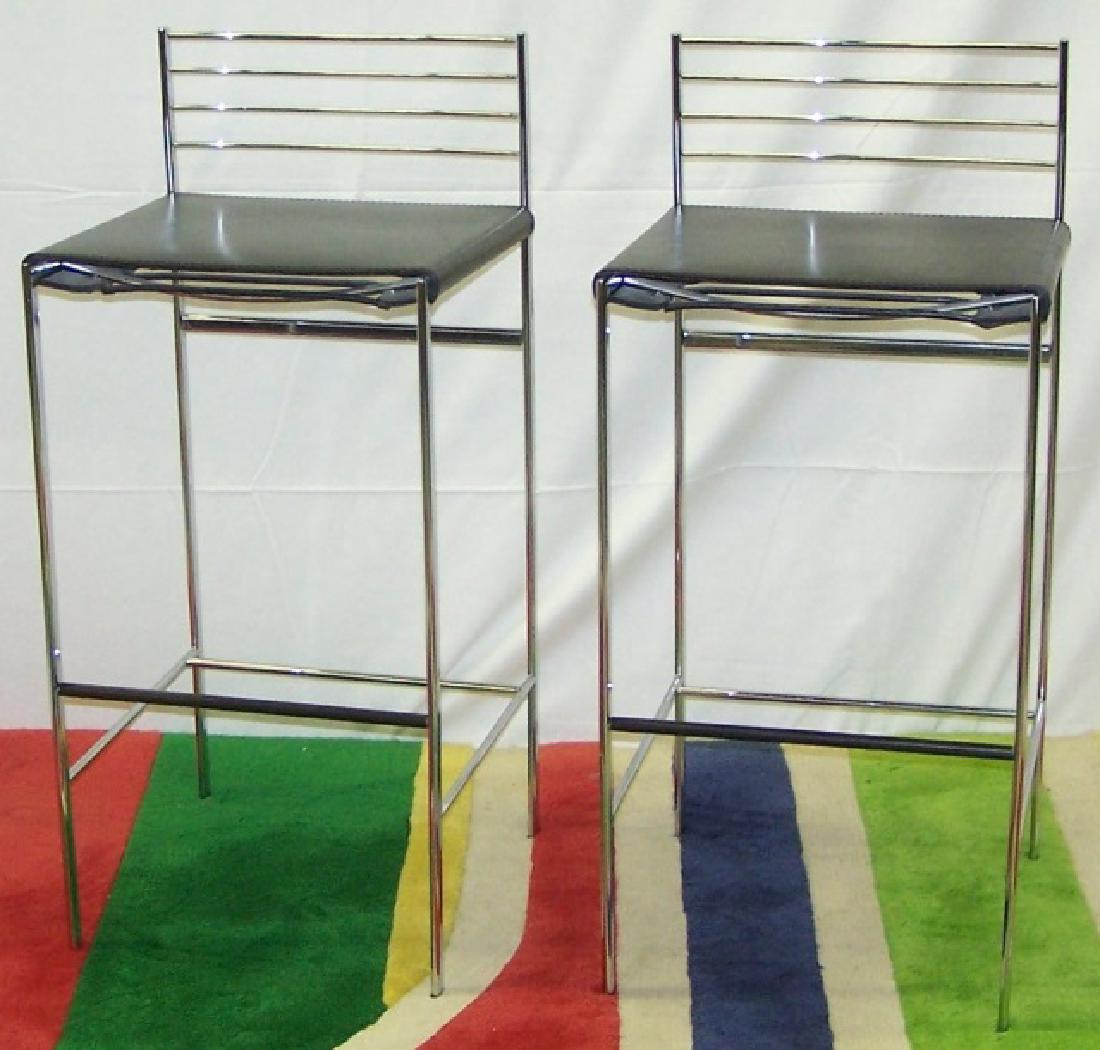 *PAIR OF MODERN STOOLS: Having black leather seats and chrome frames, Cidue, made in Italy, approximate height 36".