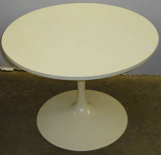 ELIEL SAARINEN TULIP TABLE: Having circular top raised on pedestal base, approximate height 17", diameter 23".