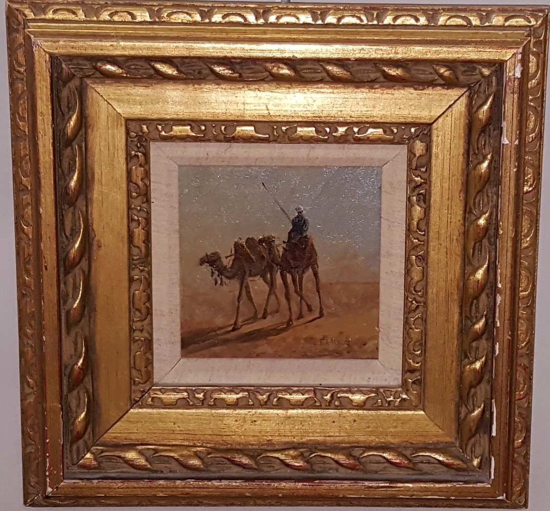 WEEKS, EDWIN: (1849-1903 American) Camels along desert road, framed oil on canvas mounted cardboard, signed lower right, approximate work size 4 3/4" x 4 3/4", frame 11 1/2" x 11 1/2".