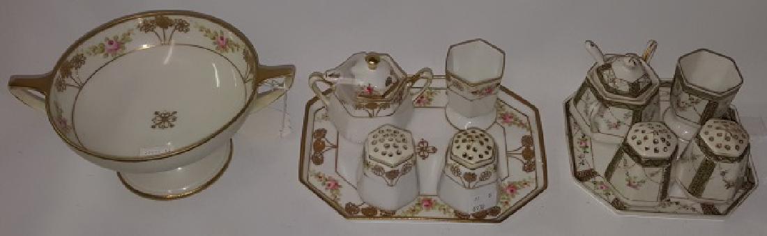 *2 NIPPON PORCELAIN CONDIMENT SETS: Each with tray, covered sugar with spoon, toothpick, and pair of shakers, and single 2-handled footed bowl.