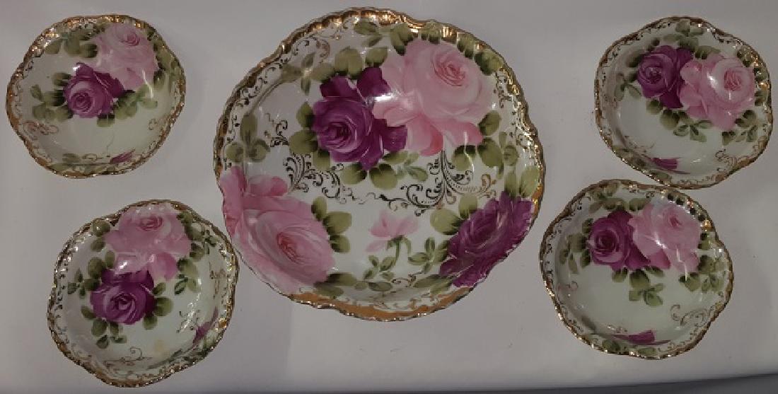 *5-PIECE NIPPON PORCELAIN BERRY SET: Serving bowl, approximate diameter 10", and 4 individual bowls, diameter 5", all having handpainted floral decoration.