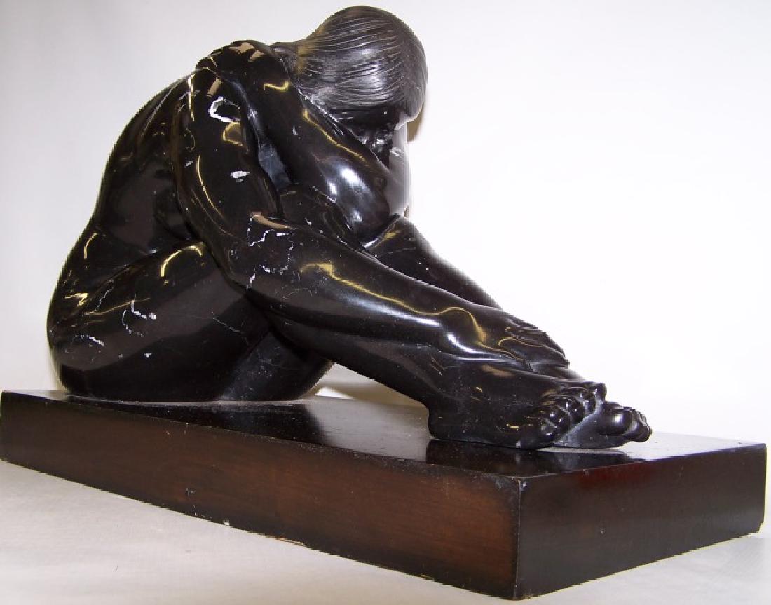 *CASTANEDA, FELIPE: (Born 1933 Mexican) Nude, black marble sculpture mounted to varnished wood base, signed and dated 1979 on bottom, approximate sculpture height 10 1/2", width 17", depth 8 1/2", with base height 13", w