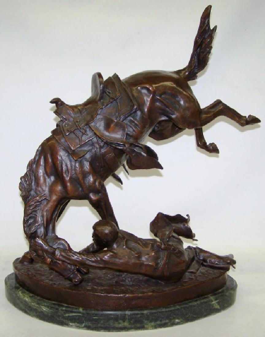 *REMINGTON, FREDERIC: "Wicked Pony", bronze sculpture mounted to marble base, impressed signature, numbered 22/100, approximate height with base 23 1/4", length 19 1/2", depth 9".