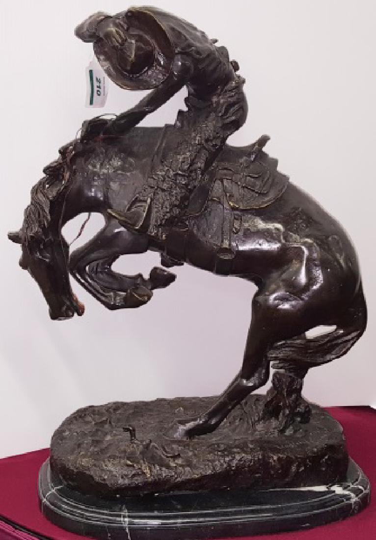 *REMINGTON, FREDERIC: Bucking bronco, bronze sculpture mounted to black marble base, impressed signature on base, approximate height with base 21 3/4", length 16", depth 10".