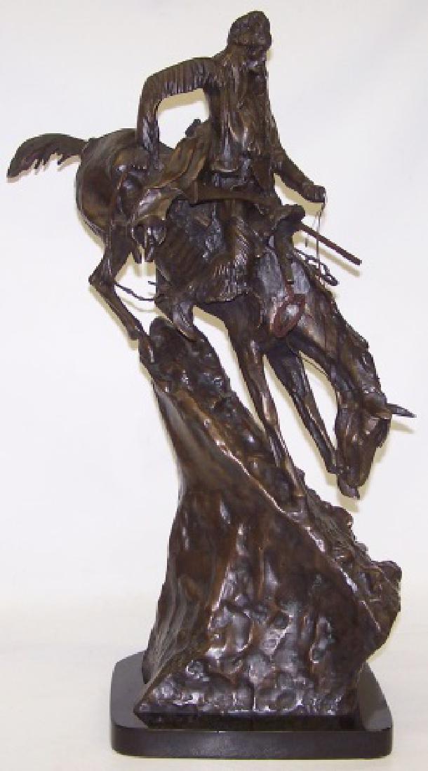 *REMINGTON, FREDERIC: "Mountain Man", bronze sculpture mounted to black marble base, impressed signature on base, approximate height with base 28 1/4", length 17", depth 13".