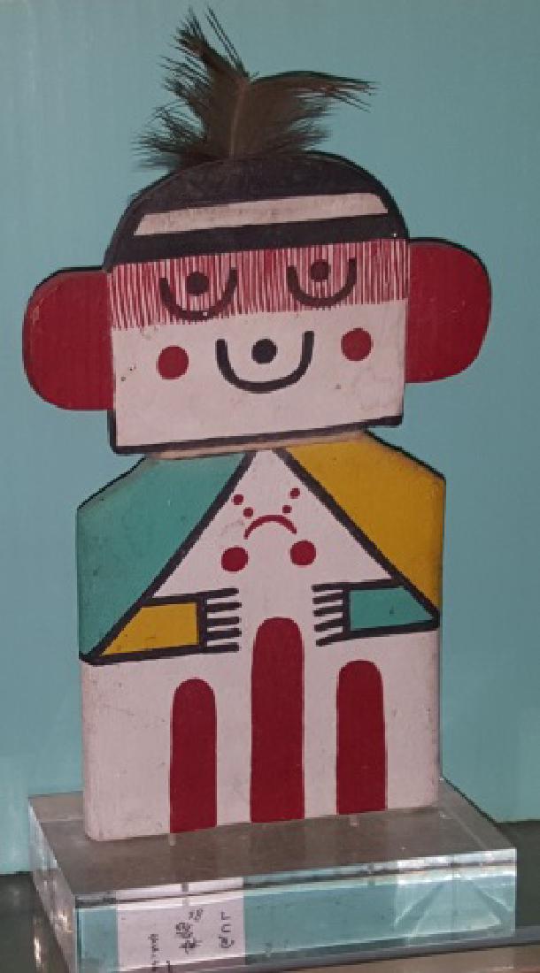 NATIVE AMERICAN CRADLE DOLL: Approximate height measuring to top of feather, with stand, 8 7/8".