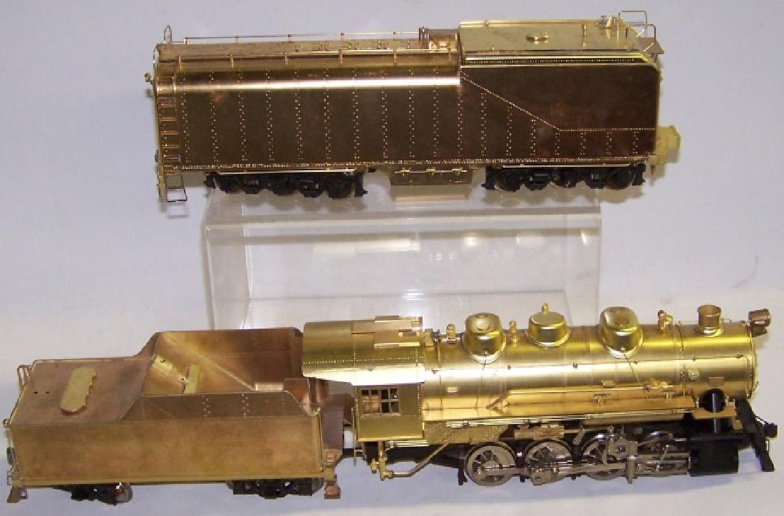 *2 BRASS TRAINS: Engine and tender, approximate length 17", and car.