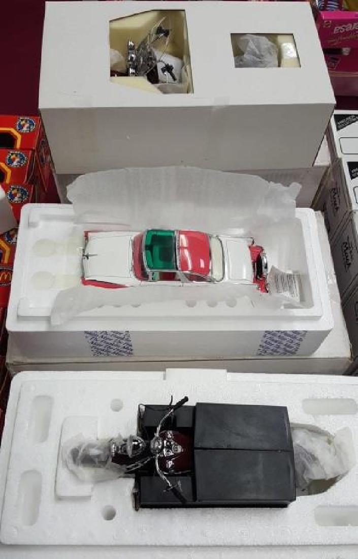 *3 FRANKLIN MINT DIECAST VEHICLES: 1955 Ford Crown Victoria and 2 motorcycles, with original boxes.