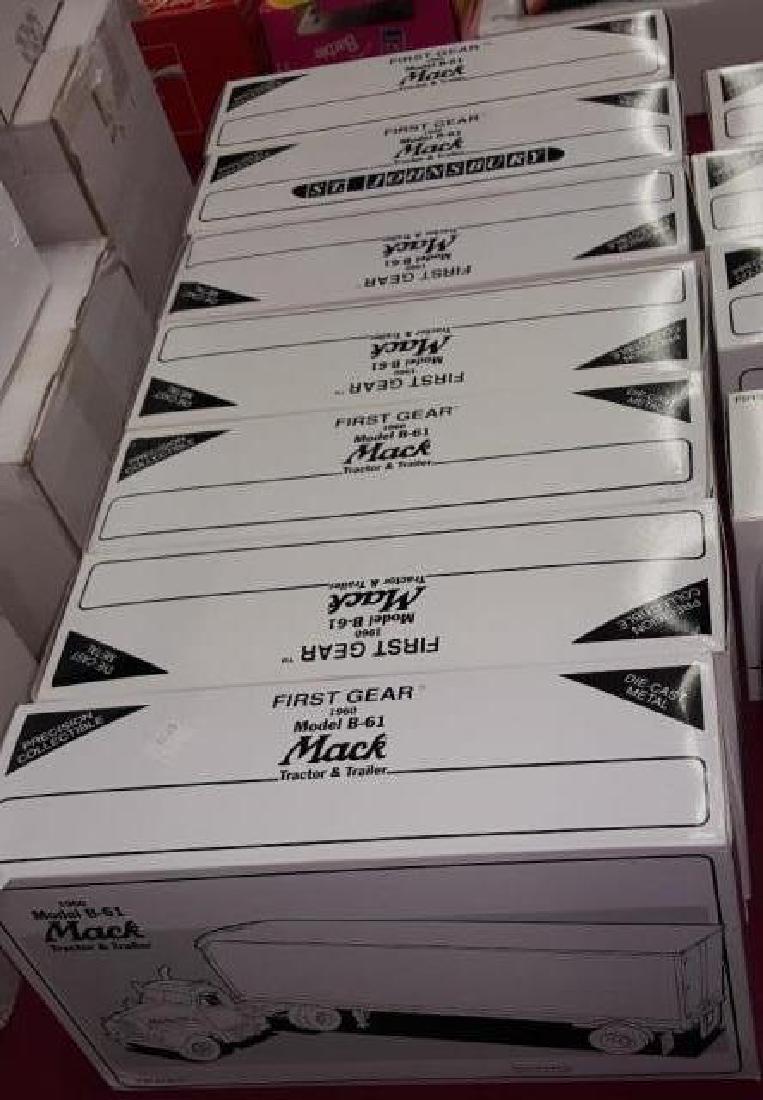 *7 FIRST GEAR DIECAST MACK TRUCKS: 1960 model B-61 mack tractor and trailer, all in original boxes.