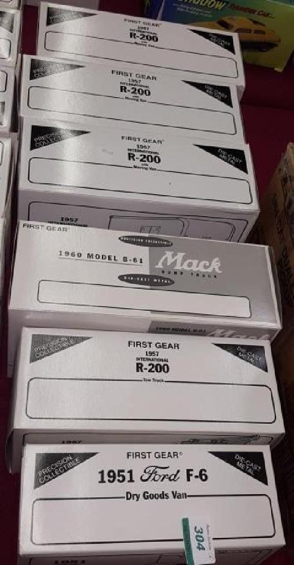 *6 FIRST GEAR DIECAST TRUCKS: 3 1957 International R-200, 1960 model B-61, 1957 International R-200 tow truck, and 1951 Ford F-6 dry goods van, all with original boxes.