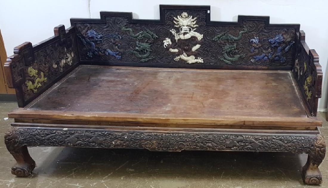 *CHINESE CARVED 3-SIDED DAYBED: Having hardstone inlay depicting dragons, approximate height 43", width 89", depth 55".