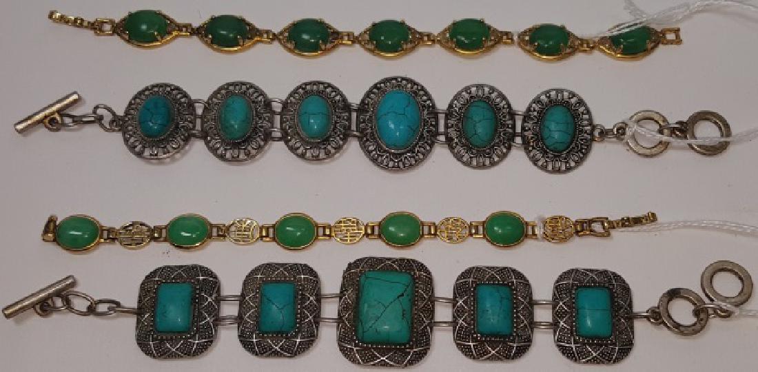 4 CHINESE BRACELETS: 3 gold tone, 1 silvertone, having jade and turquoise style inset beads.