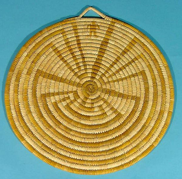 PAPAGO COIL BASKET| Bundle foundation with ''Man: PAPAGO COIL BASKET| Bundle foundation with ''Man in the maze'', plaque shaped basket, approximate diameter 18 1/2''. CONDITION: Good.
