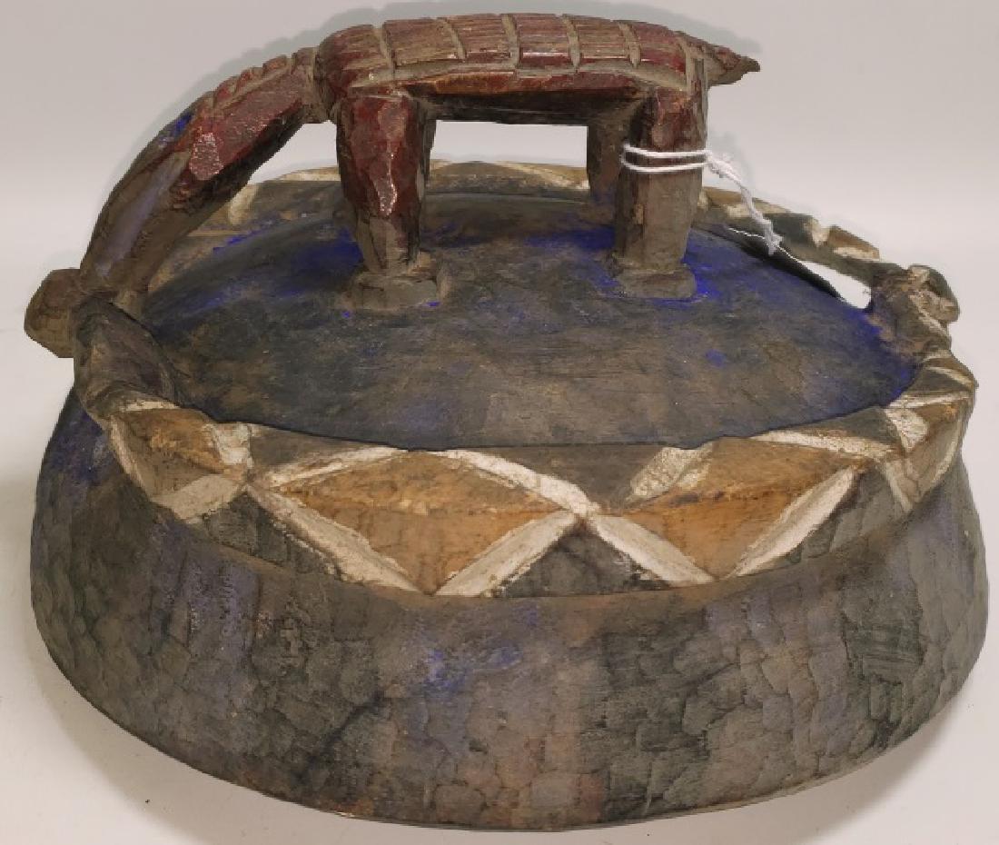 *IFA BOWL COVER: Yoruba Nigeria, with snake border and animal formed handle biting snake, approximate diameter 10".