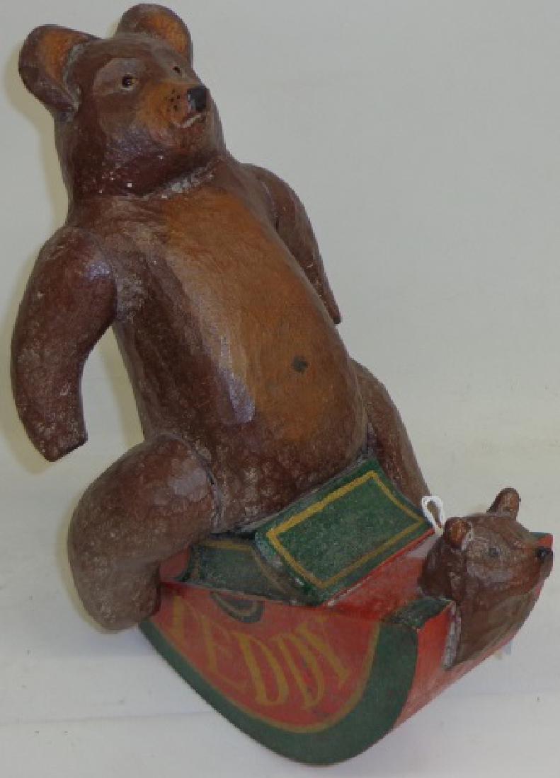*CARVED AND PAINTED TOY: Teddy bear on rocking chair, signed on underside illegibly, approximate height 12 3/4".