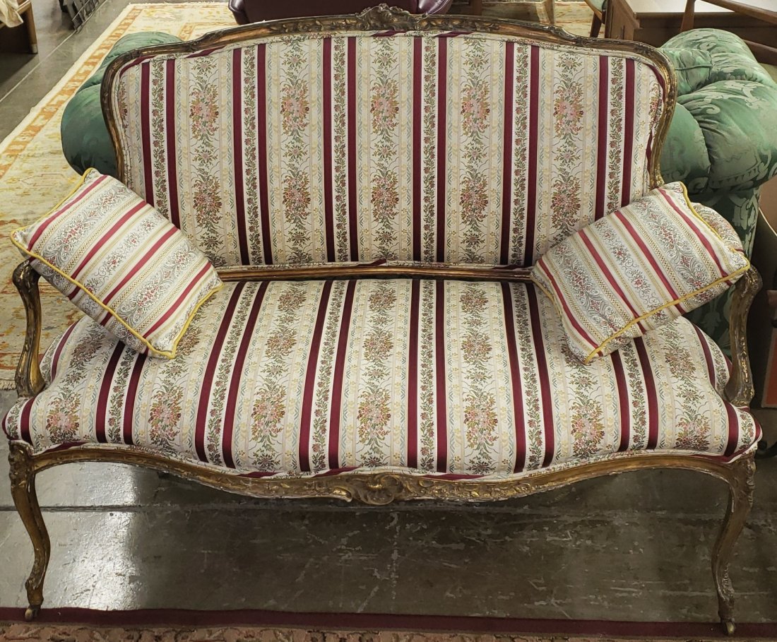 *LOUIS XV STYLE SETTEE: Having striped, leaf, and floral upholstery and gilt finish frame.