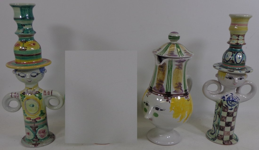 *3 PIECES OF BJORN WIINBLAD ART POTTERY: Coffee server with face of woman, marked on underside K-14 69 Danmark, height 8 1/4", and 2 figural candlesticks, 1 marked 68 Denmark 1 marked 69 Danmark, height 9 3/4".