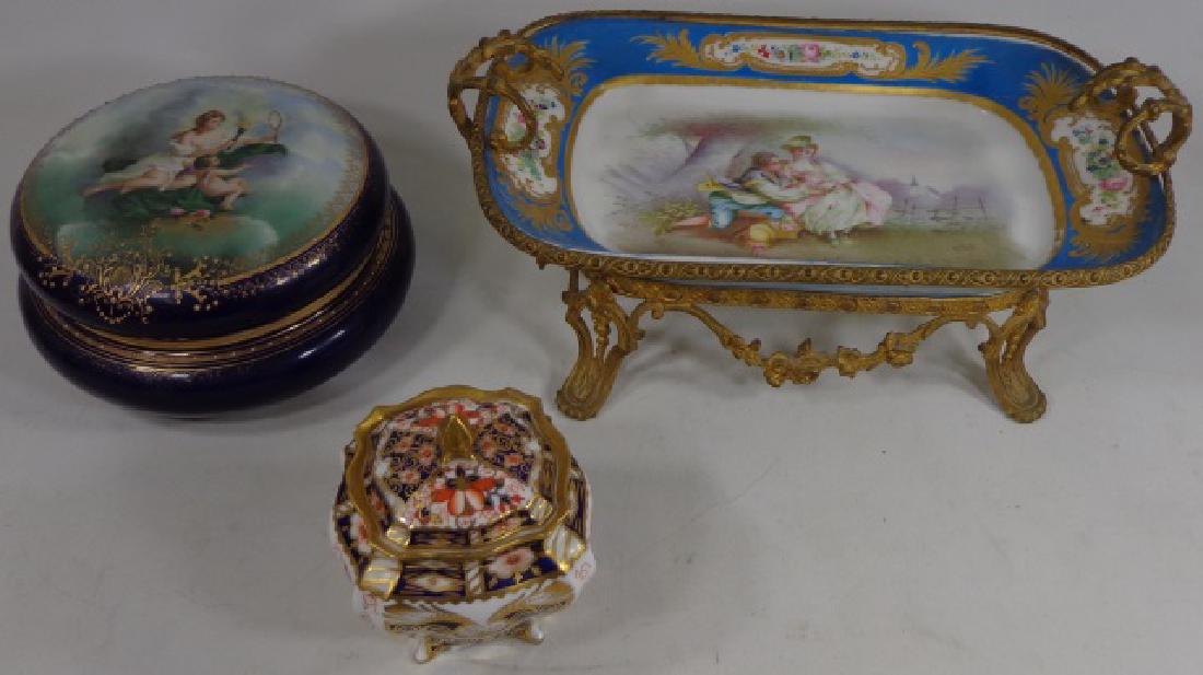 *3 PIECES: Royal Crown Derby covered bowl, tray decorated with lovers in pasture raised on gilt bronze bass, and Austrian dresser box, cover decorated with classical beauty and cherub.