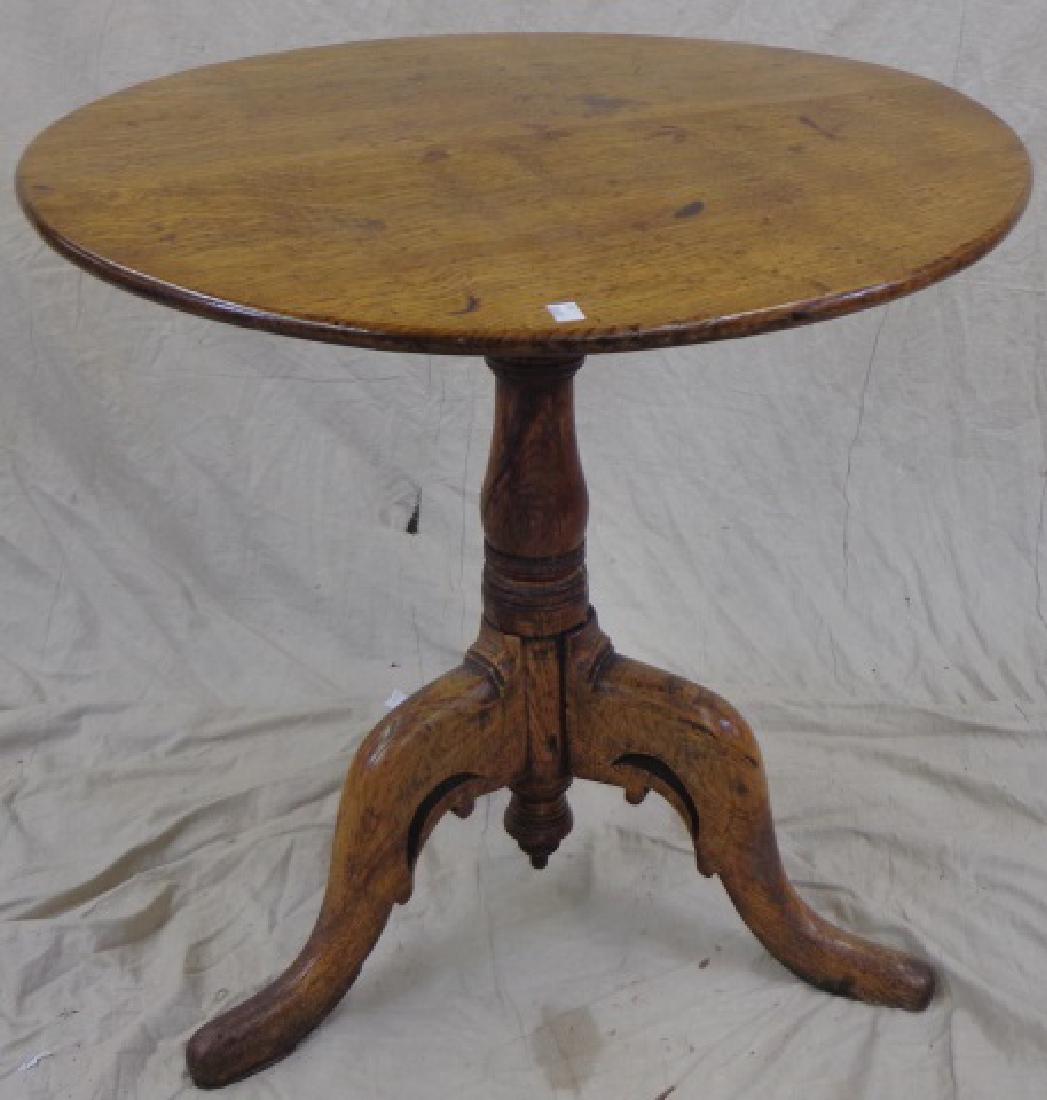 *GEORGIAN TILT TOP TABLE: Having circular top raised on birdcage base, approximate height 27", depth 27 1/2".