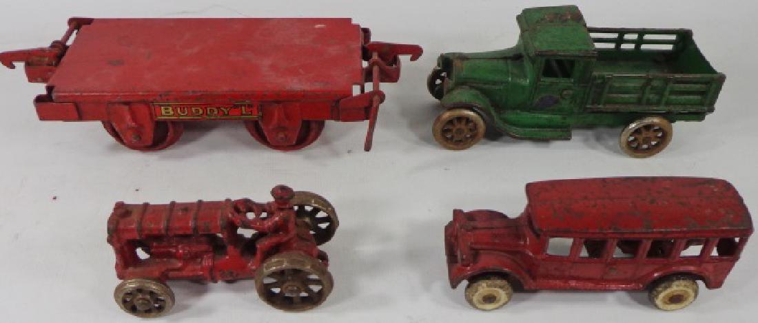 *4 TOYS: Including Arcade trucks, Buddy L trailer.