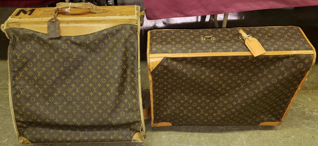 *2 PIECES OF LOUIS VUITTON LUGGAGE: Garment bag, approximate height 14", width 21", depth 6", and suitcase, height 18", width 23", depth 7".