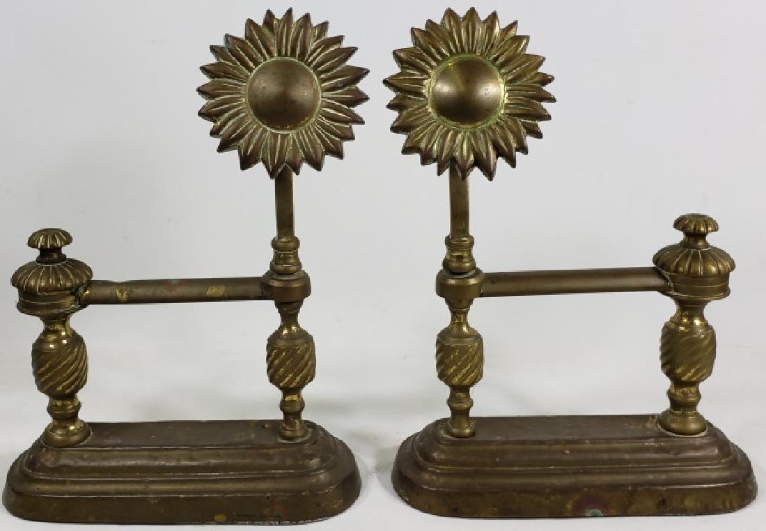 PAIR OF BRASS ANDIRONS: With sunflower decoration, approximate height 11 1/2".