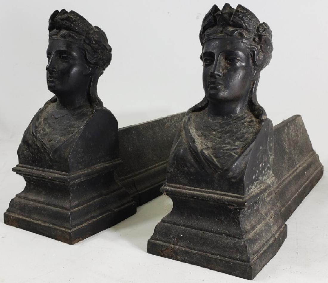 *PAIR OF ANDIRONS: Painted black metal with robed busts, approximate length 12 3/4", approximate height 8 1/4".