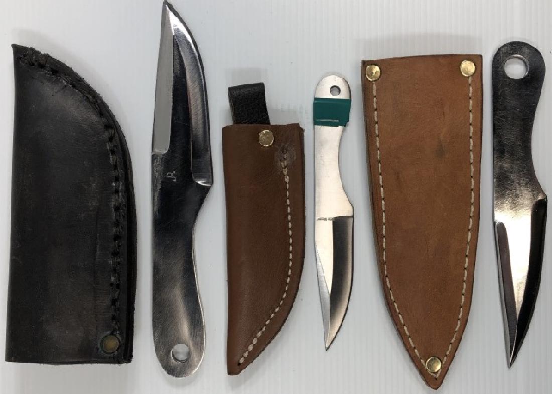 *3 THROWING KNIVES: 2 monogrammed "JR" and smallest marked "Ridge Runner", all with leather sheaths.