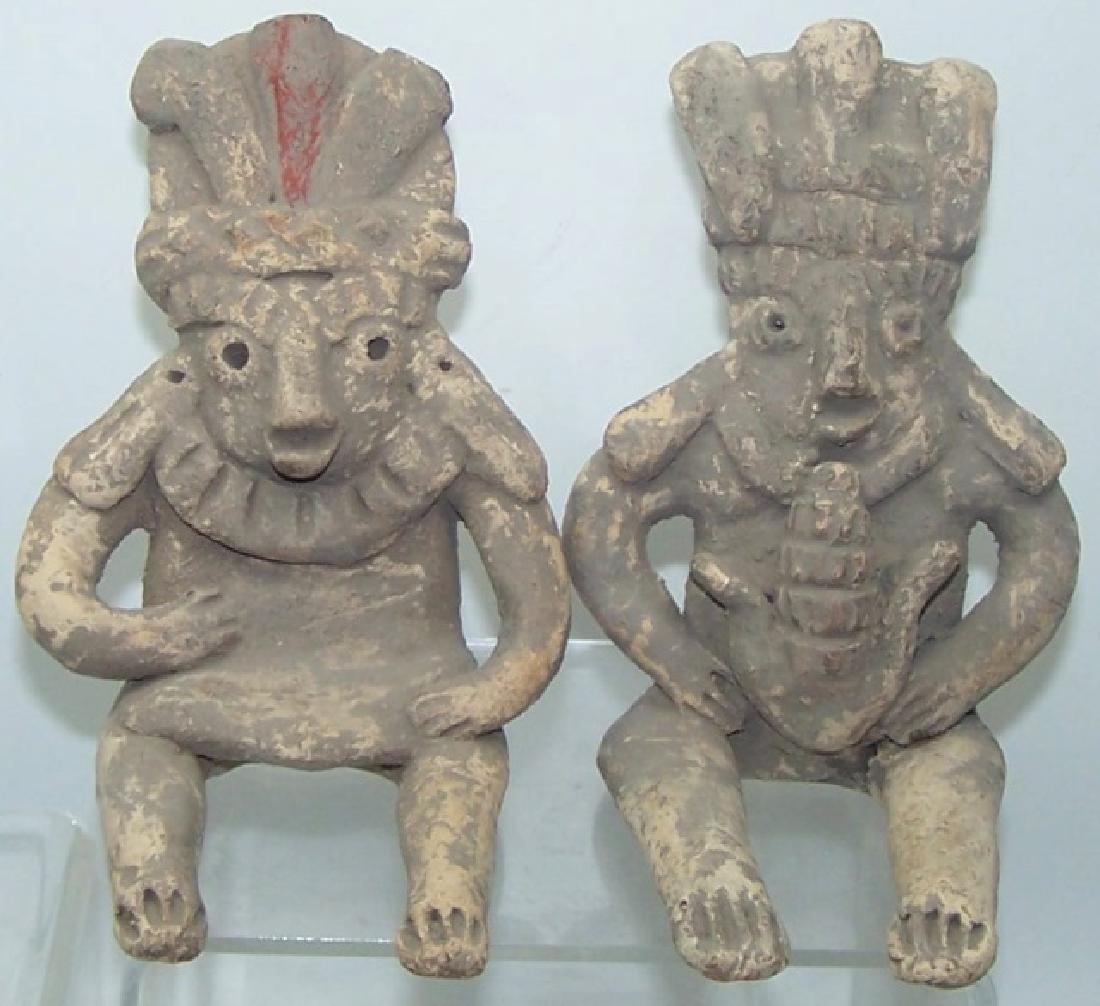 *2 PRE-COLUMBIAN STYLE POTTERY SEATED FIGURES: 1 with corn in lap, approximate height of each 5 1/8". Note: Found in Huandacareo Michoacan, Mexico near Chupicuaro tribe.