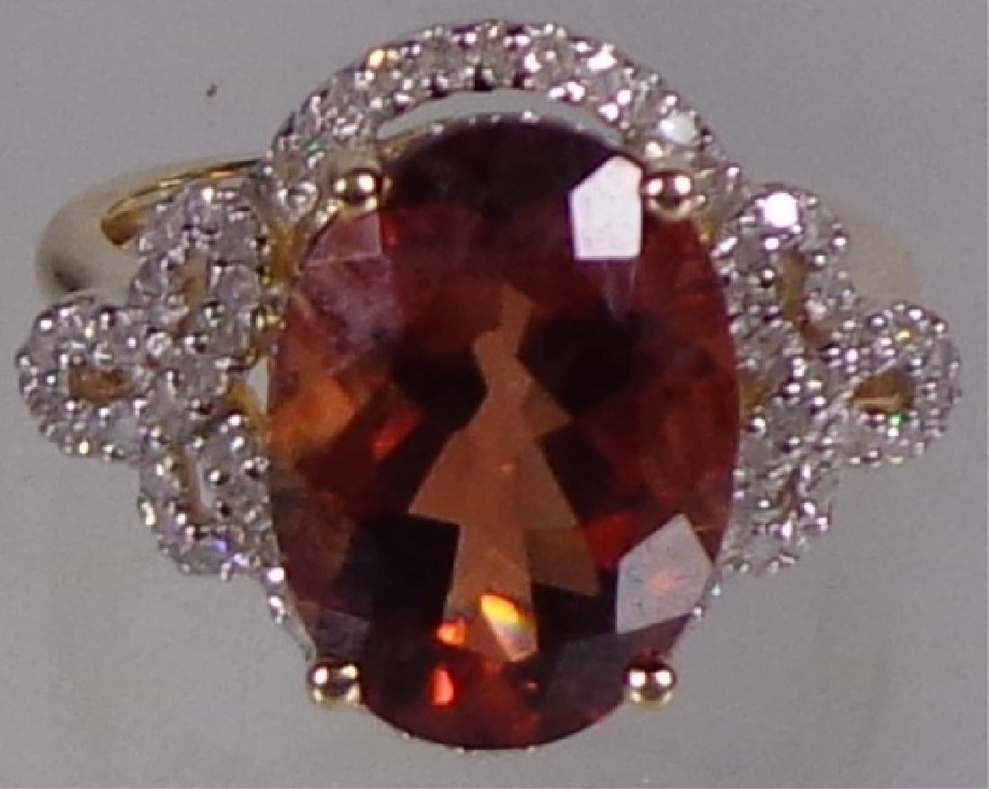 *LADIES' 14K YELLOW GOLD RING: Having large labradorite center stone surrounded by diamond, approximate ring size 7.