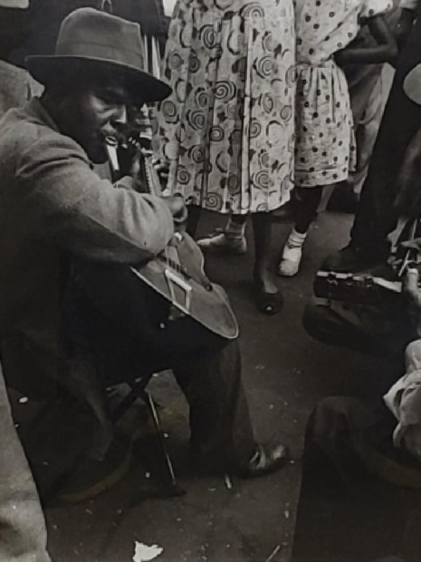 *LERNER, NATHAN: (1913-1997 American) "Guitar Player", framed gelatin silver photograph, having artist studio stamp on verso and hand signature with dedication which reads "For my good friend, Norbert. Warmest Wishes.