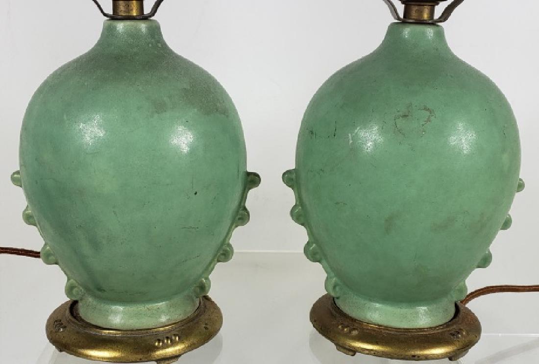 PAIR OF TECO STYLE BOUDOIR LAMPS: Having spherical base.