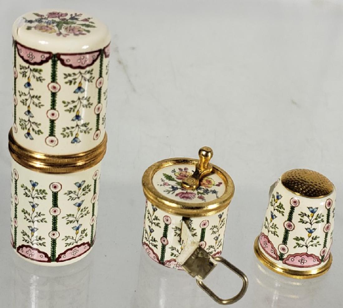 *3 PIECES: Cylindrical trinket box having draped flora, seamstress tape measure marked "Metropolitan Museum of Art" by Halcyon Days, and matching thimble.