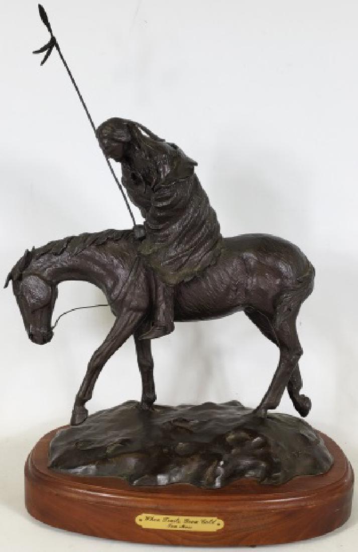 *MOSS, TOM: Bronze sculpture, "When Trails Grow Cold", signed, titled, and numbered "9/30", attached to swivel wooden base, approximate height to top of spear 19 1/4", width 14", depth 9".