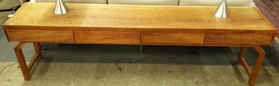 *CONTEMPORARY SIDEBOARD: Fitted with 4 drawers and raised on square legs, approximate height 25 3/4", width 85", depth 16 1/2".