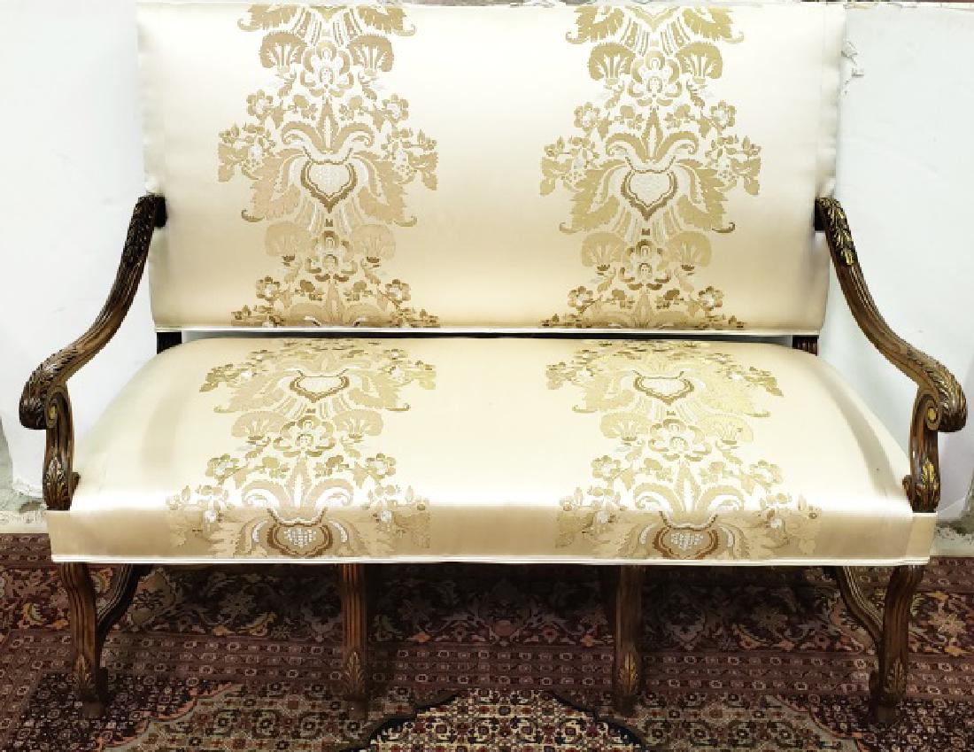*FRENCH STYLE SETTEE: Having high back and curved armrests decorated with acanthus leaves, approximate height 47 1/2", width 60".