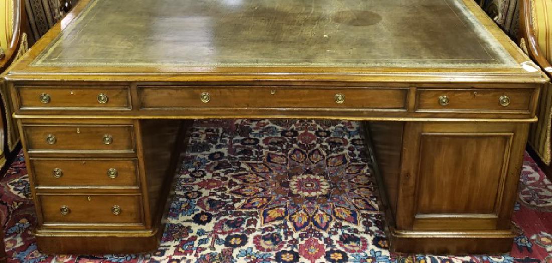 *19TH C. MAHOGANY PARTNERS DESK: Having inset leather top, raised on double pedestal base, 1 side fitted with 5 drawers and single door, other side having 6 drawers and single door, approximate height 31 1/2", width 71", depth 47".