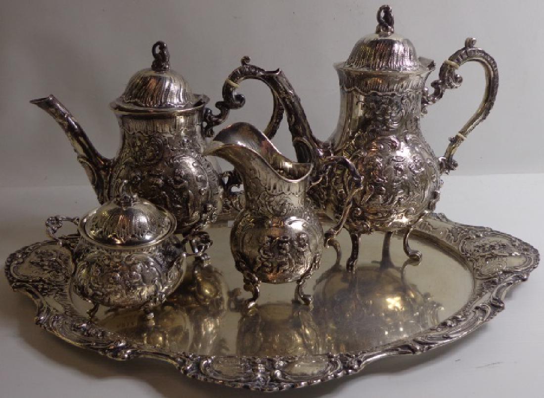 *5-PIECE 800 SILVER COFFEE SERVICE: Creamer, sugar, teapot, coffee pot, and serving tray.