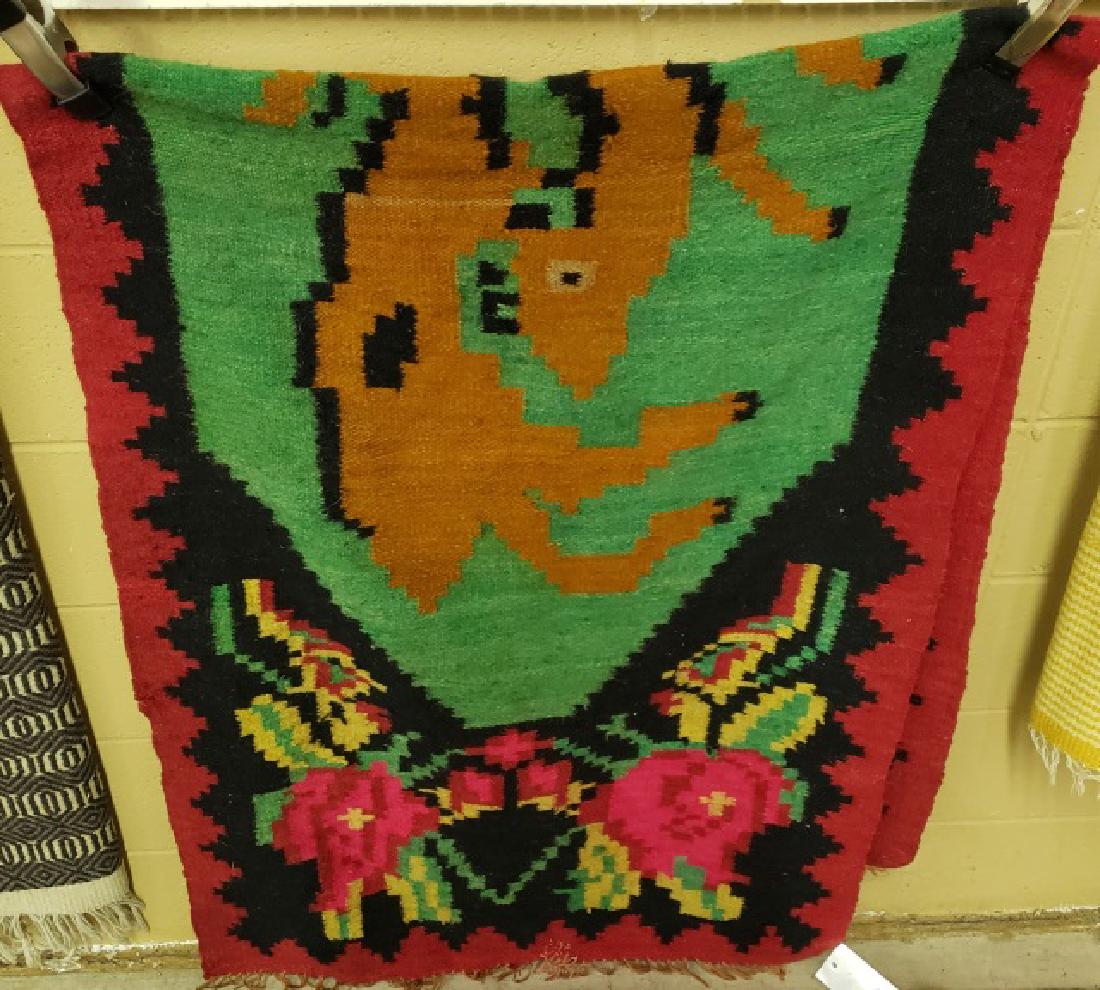 *MULTI COLORED BLANKET: Having animal and geometric design, approximate size 2' 9" x 7"