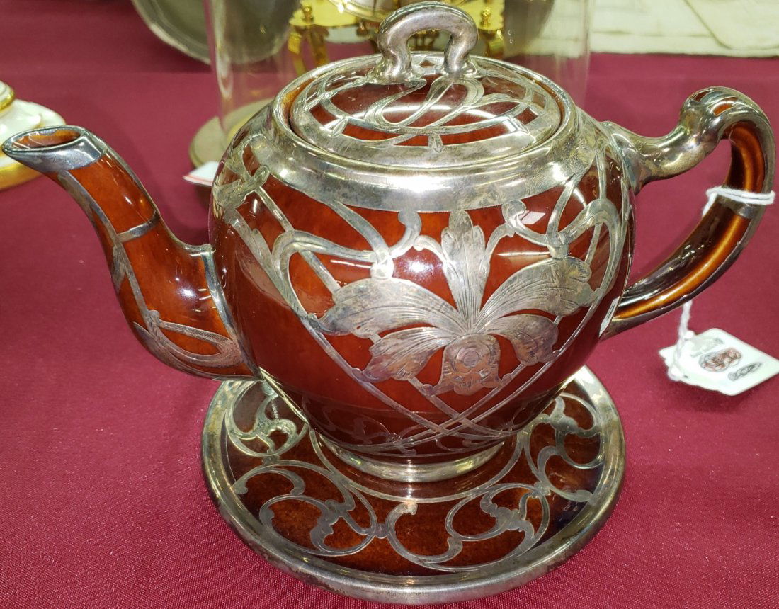 *SILVER OVERLAY TEAPOT: With trivet (rim chip).